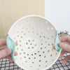 Fresh White Pottery Colander with green twisted leaf handles